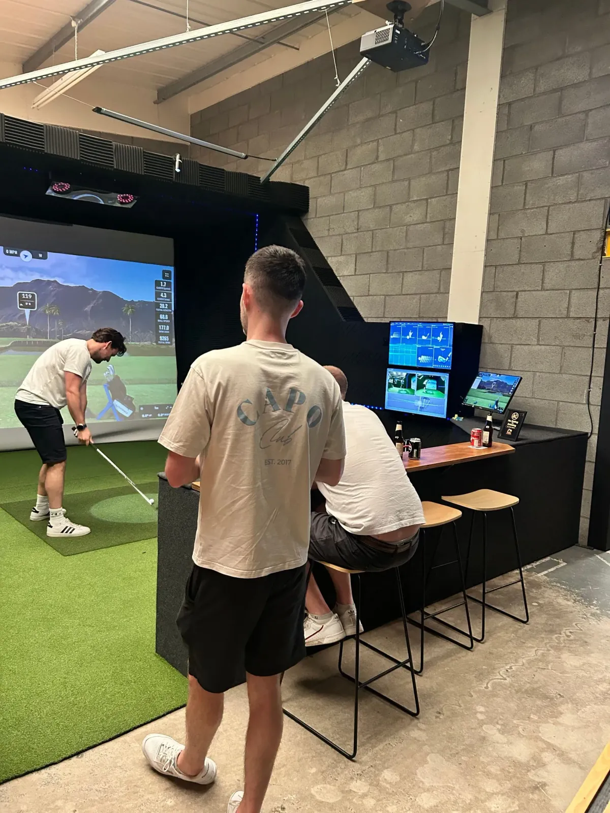 A full golf simulator bay set up and ready to play at Virtual Fairways, Darlington